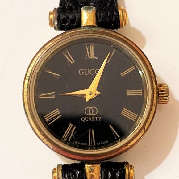 Gucci Accessories - Vintage Gucci Rare 80's Black Leather & Gold Watch